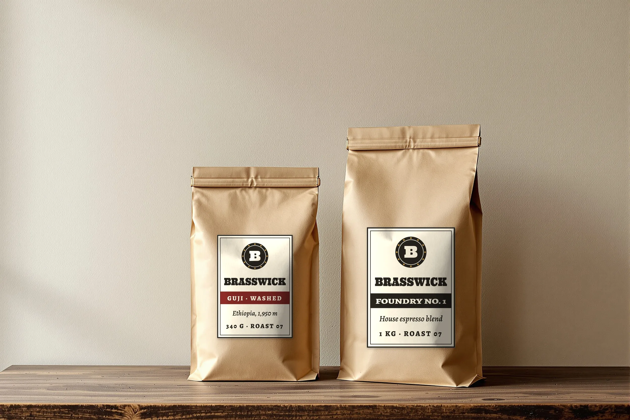 Two kraft coffee bags on an oak shelf with Brasswick labels, Guji washed and Foundry No. 1